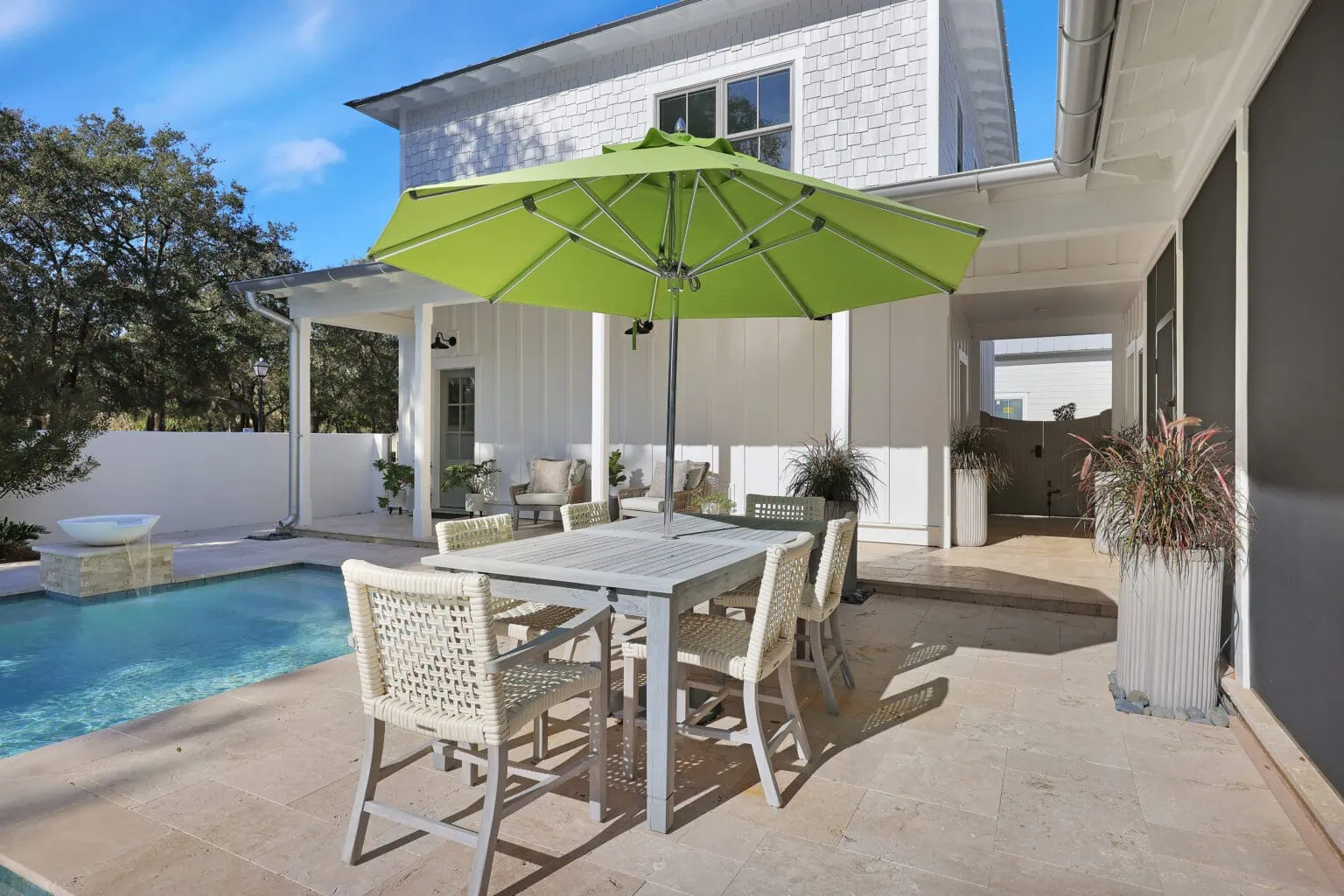 JMH Portfolio - Lowcountry Farmhouse backyard pool and table design