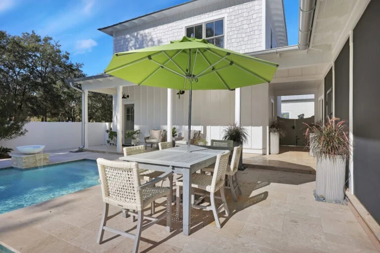 JMH Portfolio - Lowcountry Farmhouse backyard pool and table design