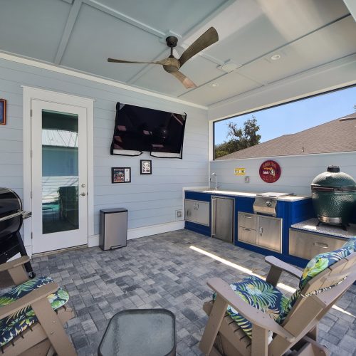 Batts Courtyard outdoor living area with built in kitchen and TV