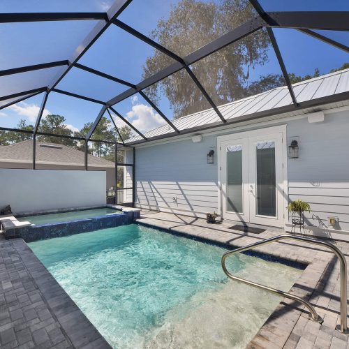 Batts Courtyard outdoor living area with enclosed pool and hot tub